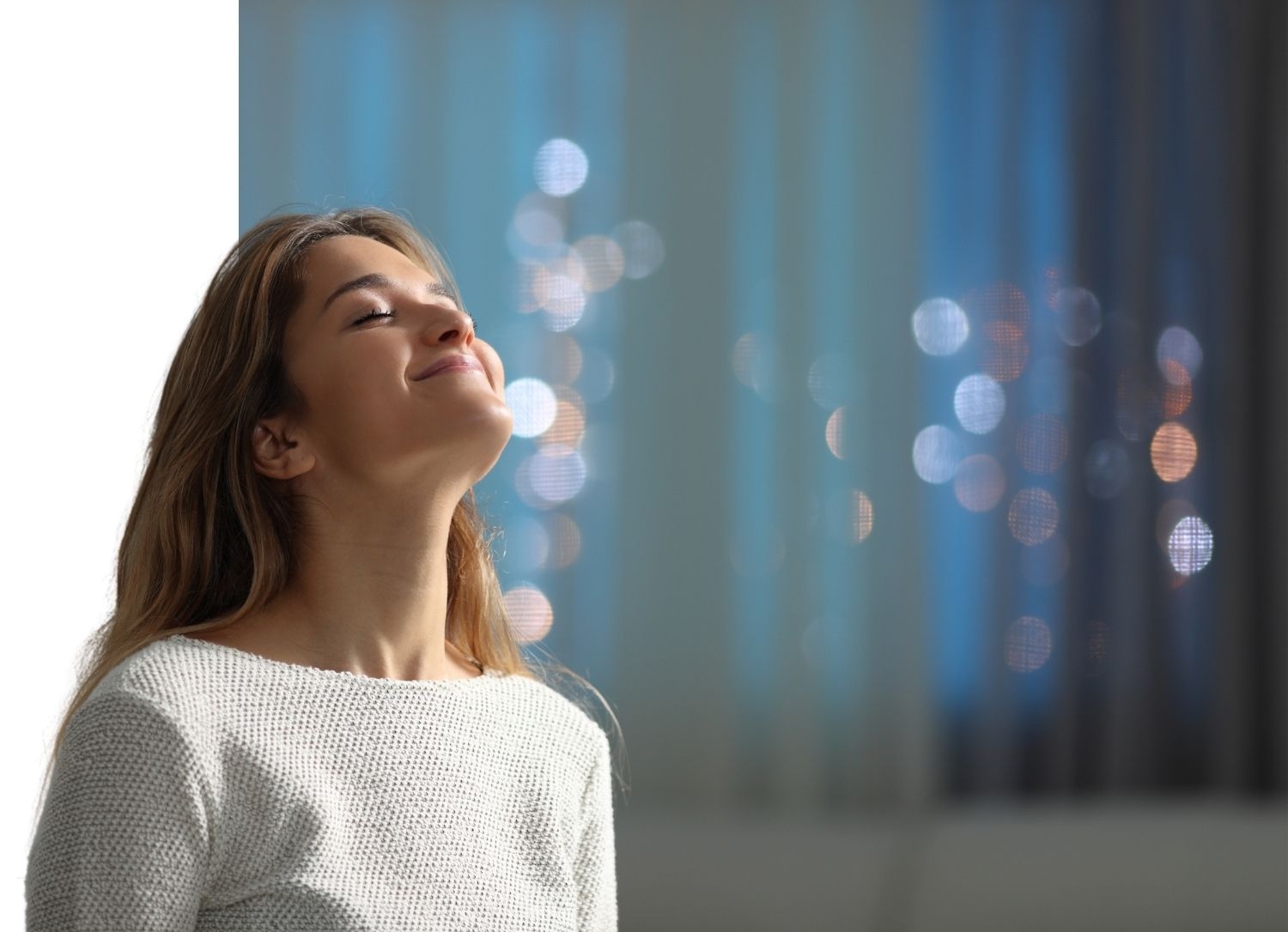 Person enjoying clean, fresh air with a CO2 monitor in hand